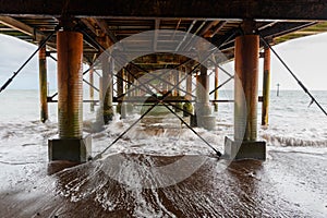 Teignmouth pier image from underneath