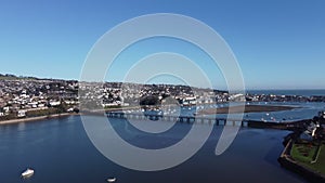 Teignmouth, South Devon, England: DRONE AERIAL VIEWS: Teignmouth, Teign Bridge, River Teign and a mainline train