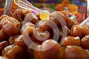 The sweet of tejocote is a typical Mexican food that is prepared in time of day of the dead and before the celebration photo