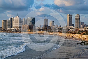 Tel Aviv, Israel - June 2013: Panoramic view of modern Tel Aviv sky line and beach on sunny day. Mediterranean sea, Israel. Sea