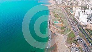 Tel Aviv sea 4k aerial hyperlapse. Waters of the Mediterranean sea washed the beach telaviv in the district of Jaffa