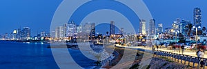 Tel Aviv skyline panorama in Israel blue hour night city sea skyscrapers