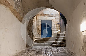 Door to the Greek Church of St. Michael on the Lane signs of the zodiac at night in on old city Yafo in Tel Aviv-Yafo in Israel