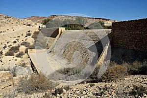 Tel-Yeruham Dam or Yeruham Dam is a masonry dam situated on the Revivim Stream, a tributary of the HaBesor Stream, Israel photo