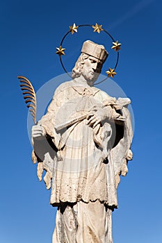 Telc town with statue of st. John of Nepomuk