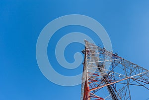 Tele-radio tower with clear blue sky.