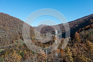 The telecom tower with blue sky. Telecommunications antenna tower in the morning.