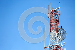 Telecom tower install communication equipment for sent signal to the city, Satellite dish telecom network in the city photo