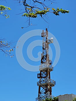 Telecom Tower for Mobile Phone Communications With Blue Sky Background