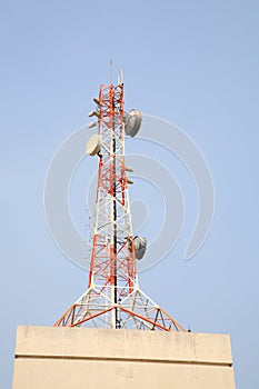 Telecom tower on top of building