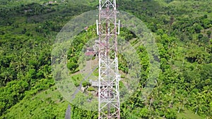 Telecommunication 5G 4G tower mast on sky background. Cellular telephone network. Digital wireless connection system