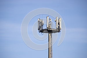 Telecommunication antenna with blue sky as background