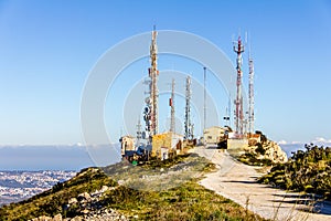 Telecommunication antennas in the Cumbre del Sol mountain photo