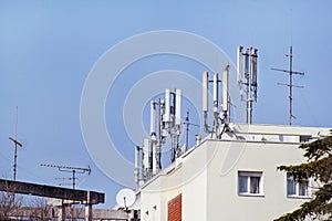 Telecommunication base stations network repeaters on the roof of