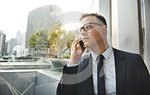 Telecommunication Businessman Talking Phone Concept