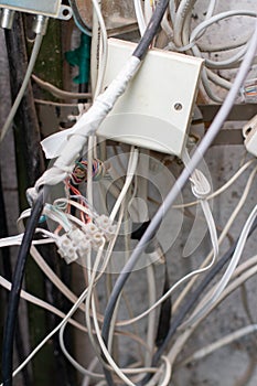 Telecommunication cabinet with electricity and wiring connector