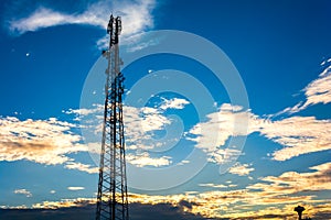 Telecommunication cellular tower in sunset sky