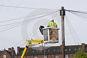 A telecommunication engineer working at height