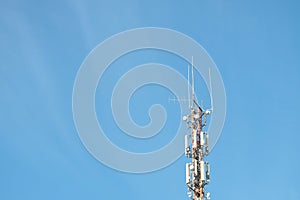 Telecommunication equipment against the blue sky. Modern technologies, 5g, communication.