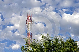 Telecommunication mast television antenna and cell tower on blue sky