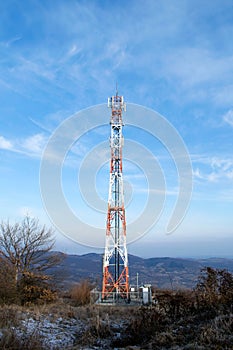 Telecommunication mast TV antennas wireless technology with blue sky in the morning