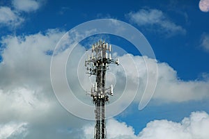 Telecommunication mast TV antennas wireless technology with blue sky