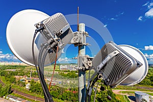 Telecommunication mast with wireless communications systems are including microwave antennas, fider, optic and pow