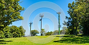 Telecommunication masts with TV antenna and 5G mobile phone transmitter