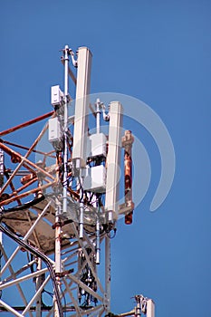 Telecommunication network repeaters, base transceiver station. Tower wireless communication antenna transmitter and repeater.