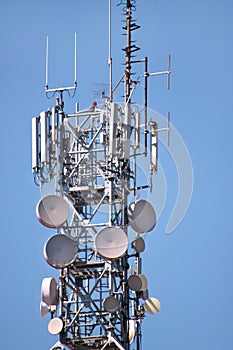 Telecommunication network repeaters, base transceiver station. Tower wireless communication antenna transmitter and repeater.