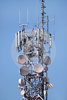 Telecommunication network repeaters, base transceiver station. Tower wireless communication antenna transmitter and repeater.