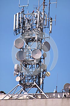 Telecommunication network repeaters, base transceiver station. Tower wireless communication antenna transmitter and repeater.