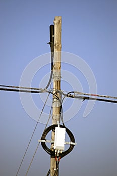telecommunication pole with lots of cables