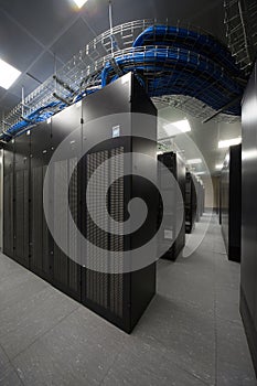 Telecommunication racks in the server room photo