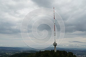 Telecommunication signal emitter or antenna for broadcasting on high placed Uetliberg mountain above Zurich in Switzerland.