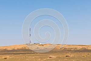 The telecommunication station in the desert with solar cell