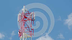 Telecommunication tower 5g near highway with car traffic. Cellular telephone network. Antenna. Cellular gsm tower with