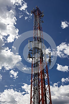 Telecommunication tower Antenna at sunset sky