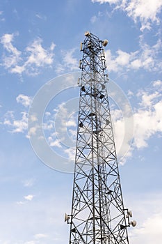 Telecommunication tower with antennas and blue sky