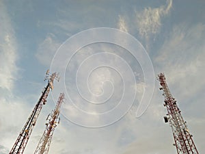 telecommunication tower in the blue sky - cityscape with copy space