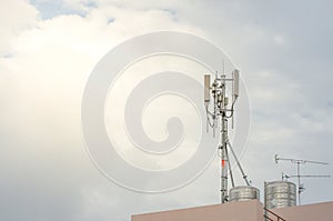 Telecommunication Tower. Cell Phone Signal Tower on sky background