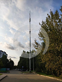 Telecommunication tower in the city. the cellular antenna