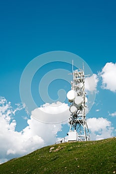 Telecommunication tower with many antennas and repeaters