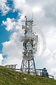 Telecommunication tower with many antennas and repeaters