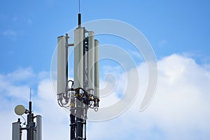 A telecommunication tower and mast with heptaband antenna including 4G LTE, 3G UMTS, GSM, DCS bands