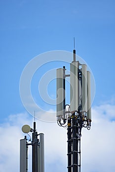 A telecommunication tower and mast with heptaband antenna including 4G LTE, 3G UMTS, GSM, DCS bands