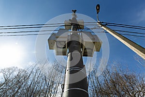 Telecommunication tower with microwave equipment, radio panel antennas, outdoor remote radio units, power cables