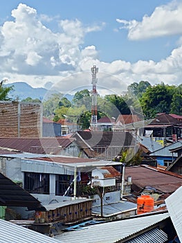 Telecommunication tower in the middle of a dense residential area in Rantepao City, North Toraja