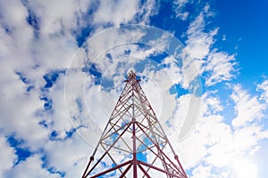 Telecommunication tower with panel antennas and radio antennas and satellite dishes for mobile communications 2G, 3G, 4G