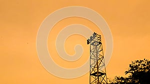 Telecommunication tower at sunset